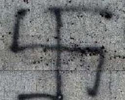 Swastikas on frontages of kosher stores in Paris