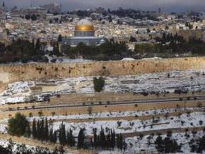 Snow falls in Jerusalem, as winter storm peaks