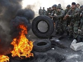 Hariri loyalists take to the streets of Lebanon for &#039;day of wrath&#039; over Hezbollah power play