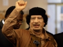 Gadhafi loyalists fight to take back strategic city