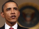 Obama threatens Libya with military action