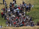 Syria: Up to 14 Palestinians killed as hundreds of protesters storm Israel border