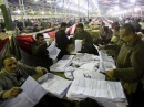 Egypt delays poll results for 2nd time; army official paints dire picture of economy