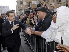 Sarkozy, after bitter halal debate, visits main Paris mosque