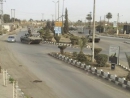 Syrian tanks in action four days before pullout date