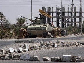 Egypt army raids Sinai; Morsy fires senior officials