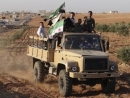 Syria rebels plan transitional gov&#039;t, seize nuclear center