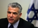 Lapid &#039;worried&#039; over economy, said to cut defense