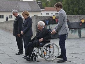 German Chancellor Merkel makes historic visit to Dachau