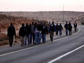 African migrants leave open detention facility, now marching to Jerusalem