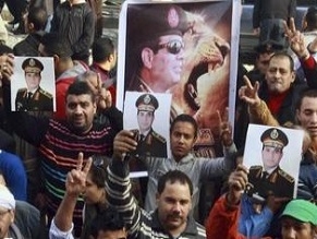 At least 10 killed as Egypt votes on constitution