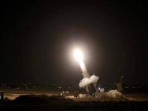 Iron Dome intercepts rockets over cities across Israel in largest salvo of rockets yet