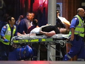 Australian Police storm Sydney cafe ending 16-hour hostage crisis; 2 reportedly killed