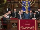 Merkel vows to protect Jews and Muslims living in Germany