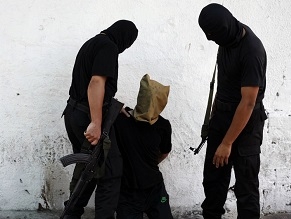 Amnesty: Hamas guilty of war crimes against Palestinians during Gaza war