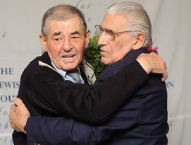 Holocaust survivor, savior reunite 64 years later