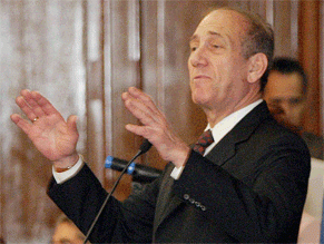 Olmert denies involvement in Holyland scandal